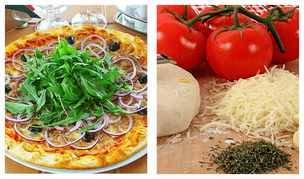 A pizza sitting on top of a table next to tomatoes.